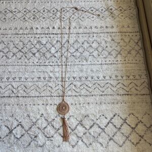 Elegant Gold Pendant Necklace with Tassel